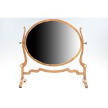 An early 20th Century reproduction Sheraton style mahogany swivel toilet mirror, 51 cm x 50 cm