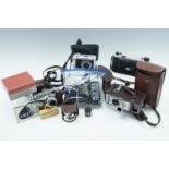 Cameras and accessories including a Voigtlander Vito B, a Kodak Junior 2 and a Bell & Howell 624 8