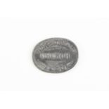 An 1835 Torthorwald Church communion token. [Torthorwald. Village and civil parish in Dumfries and