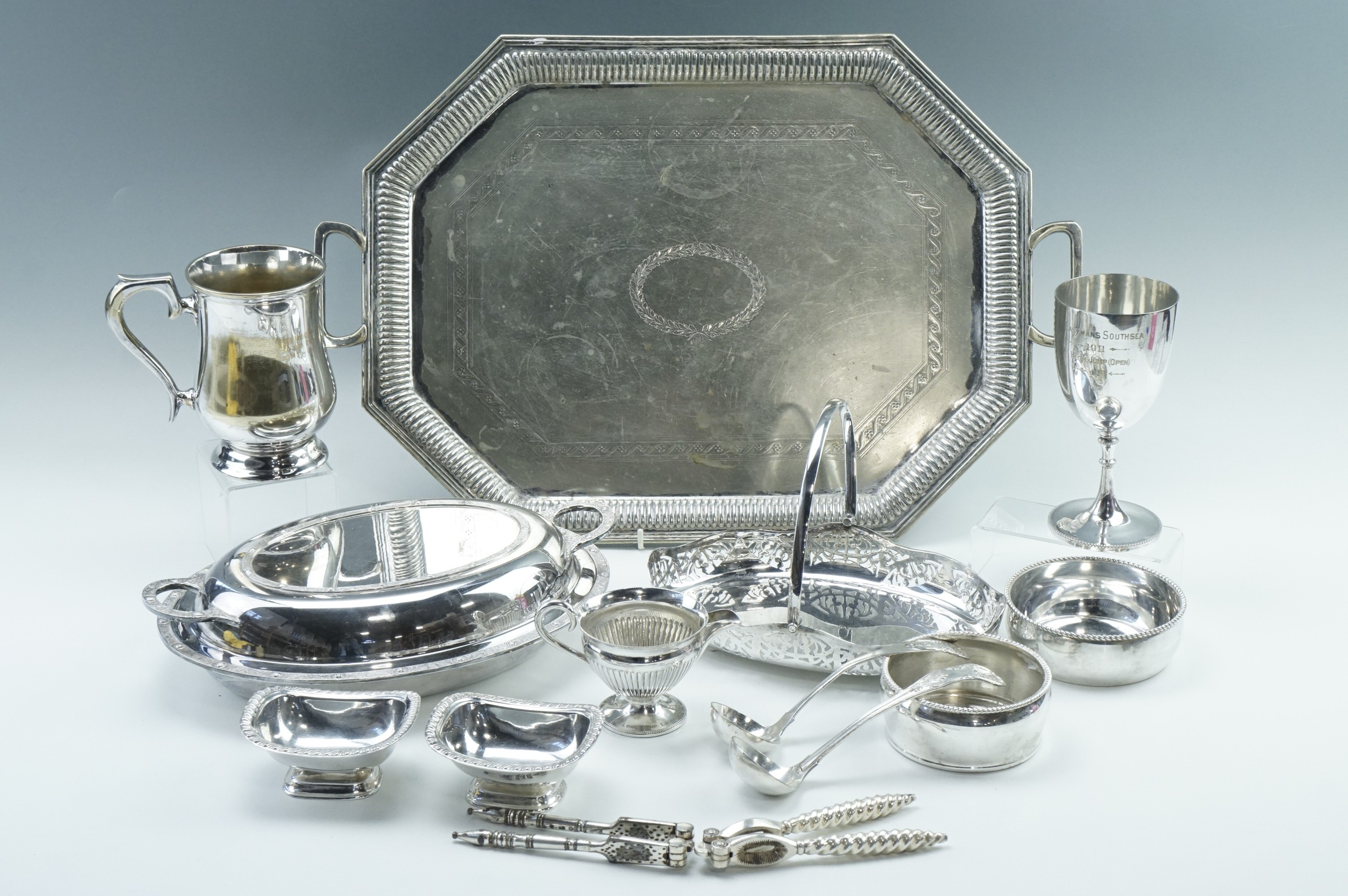 A group of late 19th / early 20th Century electroplate, including a two handled tray, a tankard, two