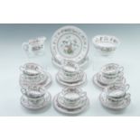 A Royal Worcester tea set decorated with stylized peonies, approximately thirty five items, (one cup