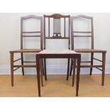 A pair of Edwardian caned mahogany bedroom chairs, and a mahogany chair, 91 cm