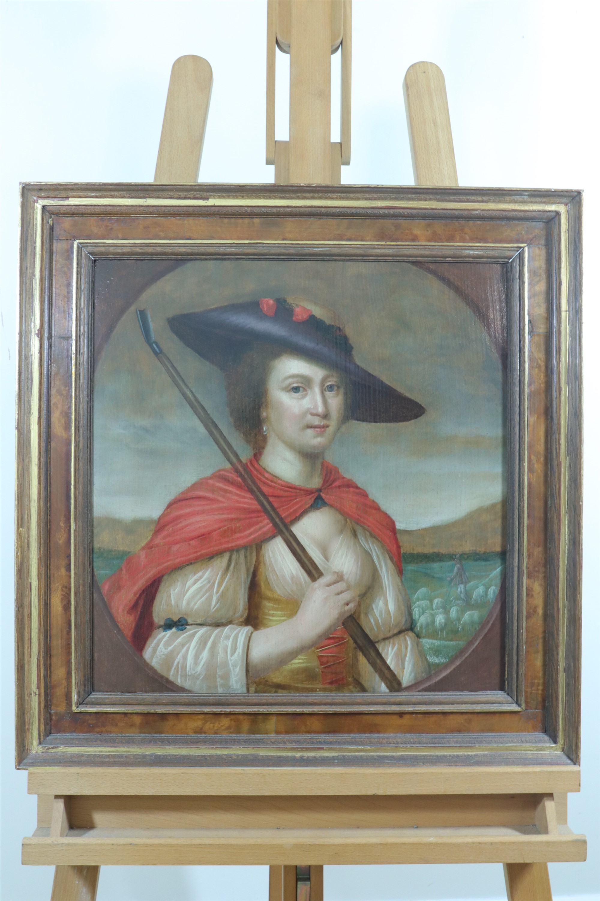 An 18th Century portrait of a lady as a shepherdess, oil on oak panel, restored, unsigned, in a - Image 2 of 2