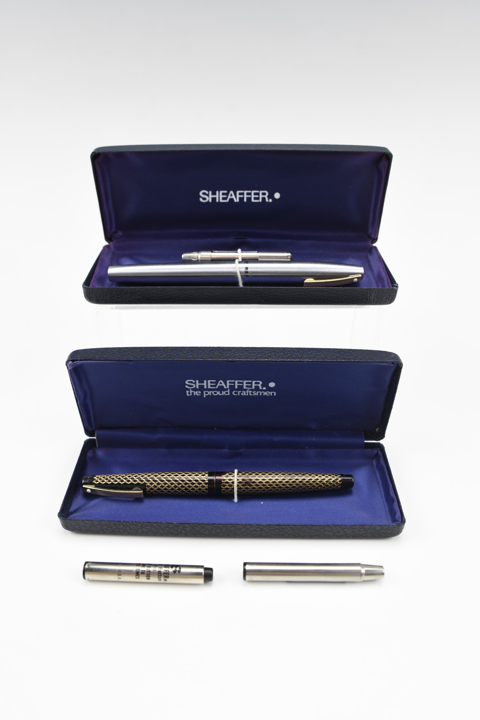 Two cased Sheaffer fountain pens, including one with nib marked '14k'