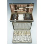 Vintage cased sets of cutlery including fish servers, fish knives and forks, with a cased fruit