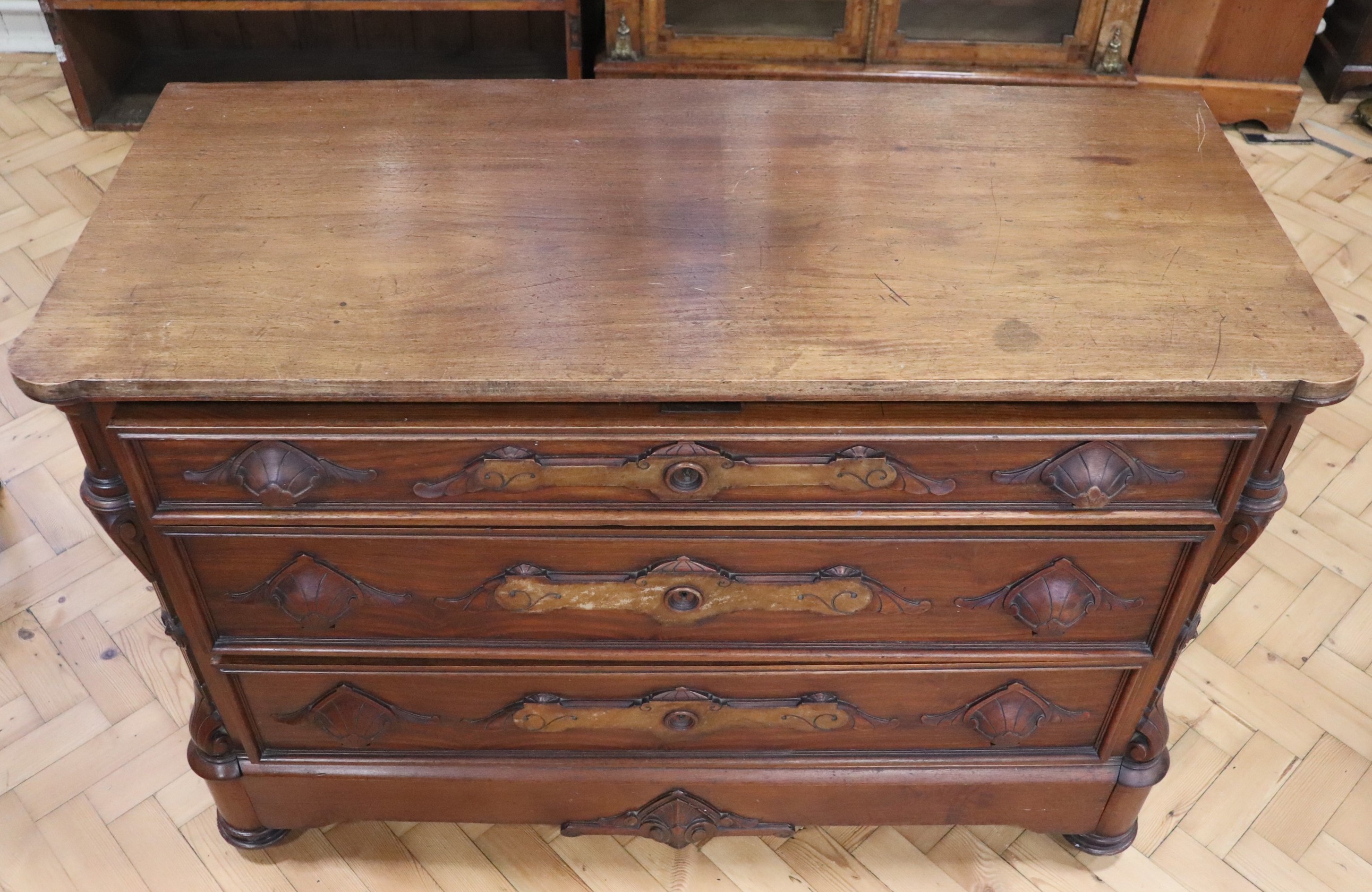A German late 19th / early 20th Century carved walnut chest of three drawers, the - Image 2 of 2