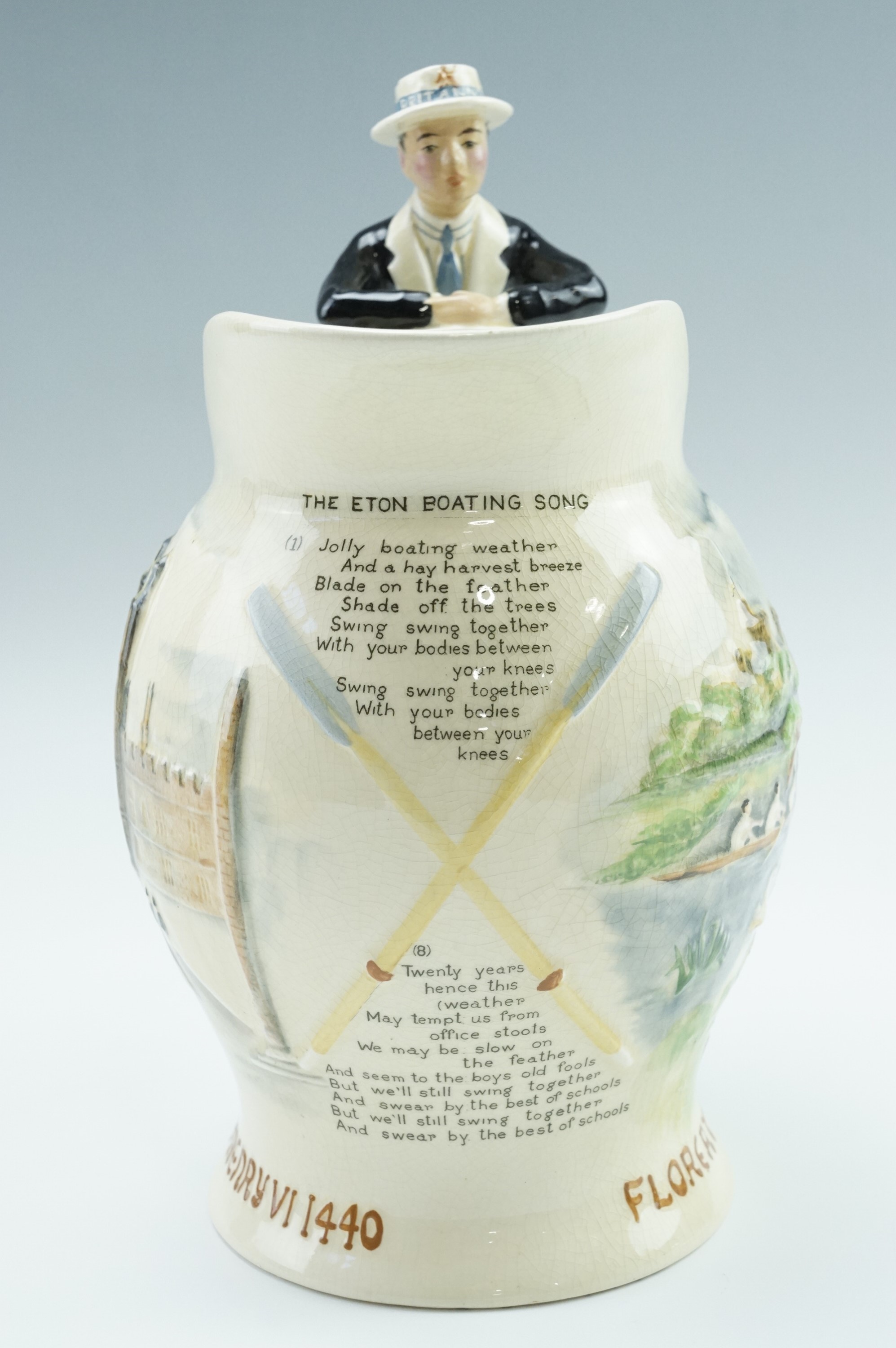 A 1920s Fielding's Crown Devon musical jug, having a handle modelled as a boatman, the outside - Image 2 of 3