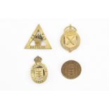 Four various Ordnance factory worker badges
