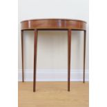 A 20th Century Sheraton revival demi-lune mahogany side table, having tulipwood cross banding, 81