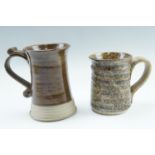 Two studio pottery tankards, tallest 16 cm