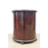 A Victorian mahogany veneered cylinder commode, having period ceramic liner and an additional