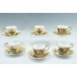 Six Aynsley Orchard Gold teacups and saucers, transfer decorated with fruit, late 20th Century, cups