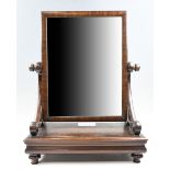 An early Victorian mahogany swivel toilet mirror