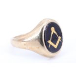 A 9 ct gold Masonic signet ring, the table set with sardonyx inlaid in gold with the Mason's