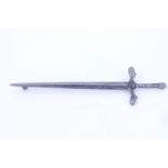 An Edwardian silver kilt pin in the form of a romanticized two-handed great sword or claymore,