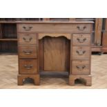 An old reproduction George III mahogany kneehole desk, 87 x 50 x 75 cm
