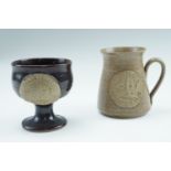Two items of Kendal Studio Pottery, commemorating the Carlisle Great Fair 1977, tallest 10.5 cm