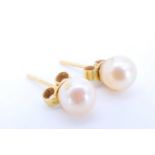 A pair of pearl and 9 ct gold stud earrings, pearls 6 mm