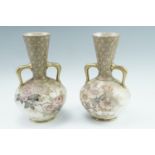 A pair of late 19th Century Doulton Burslem two handled vases, of ovoid form with an inverted