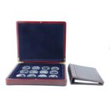 A cased collection of 18 royal commemorative silver proof coins, celebrating Queen Elizabeth's