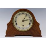A 1950s Elliott mahogany mantle clock, (running when catalogued accuracy and reliability