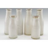 A quantity of vintage display milk bottles including "Horrells", "United Dairies" etc, 2nd quarter