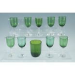Six Victorian emerald glass cordials, together with a beaker and other stemware, tallest 12 cm