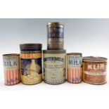 Six vintage dried milk tins including "Ostermilk" and "Klim" together with two "National Household