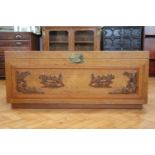 A late 20th Century Chinese carved camphor wood chest, 122 cm x 51 cm x 52 cm