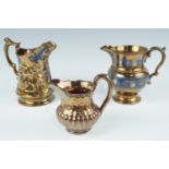 Three Victorian copper lustre jugs, (free from damage and restoration), tallest 18 cm