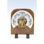 A late 20th Century table top aneroid barometer by Priest Ashmore, Sheffield, having an open