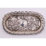 A small Edwardian silver rounded oblong tray, having a gadrooned rim, Britton, Gould & Co,