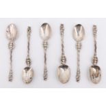 A set of six 19th Century Dutch cast white metal apostle teaspoons, the twisted stems having pierced