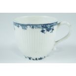 An 18th Century Worcester teacup, having reeded sides and underglaze blue rim and foot, crescent