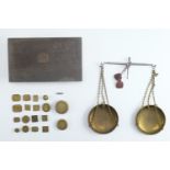 A cased set of 19th Century brass and steel bullion scales, in a fitted oak case with troy and penny
