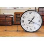 A large late 20th Century reproduction railway station platform type clock, having twin 240 vac