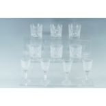 Four Waterford "Lismore" pattern sherry glasses together with six Edinburgh Crystal whisky tumblers,