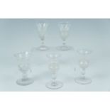 Five Victorian cut glass thistle form liqueur glasses, including a pair, approximately 9 cm