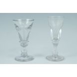 Two deceptive or toasting glasses, having baluster stems, second quarter 19th Century, tallest 12