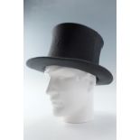 A vintage collapsible opera hat by Austin Reed