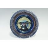 Tobias Harrison (Cumbrian, Contemporary) An art pottery lustre glazed shallow bowl, circular with