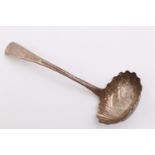 A George III Old English pattern silver sauce ladle, having lightly gadrooned edges and a shell form