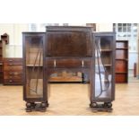 A 1930s glazed oak combined fall-front bureau and bookcase / cabinet, 32 cm x 124 cm x 114 cm