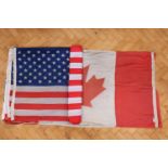 Three vintage cotton Canadian flags together with three USA flags, approximately 180 x 90 cm