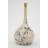 An early 20th Century Chinese rose water bottle decorated with birds amongst bamboo, three character