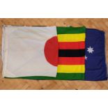 Five vintage cotton flags, comprising three Australian, Japan and a Zimbabwe, approximately 185 x 87