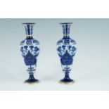 A pair of late 19th Century William Moorcroft for Macintyre Burslem Aurelian Ware vases, 22 cm