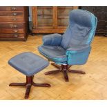 A blue hide upholstered revolving lounge armchair and Ottoman