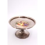 A George V Royal Worcester and silver metamorphic tazza, the inset plaque hand painted in