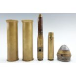 A relic Great War British No 80 artillery shell fuse, a pair of trench art shell case vases, a